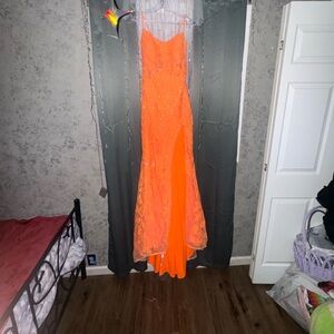 Gorgeous orange prom dress from the prom shoppe never worn size 8